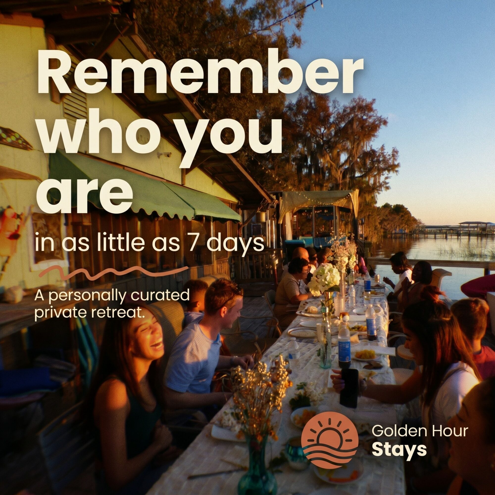 People sitting at a long outdoor table during sunset, with trees and a bridge in the background, promoting a retreat. Word count: 20.
