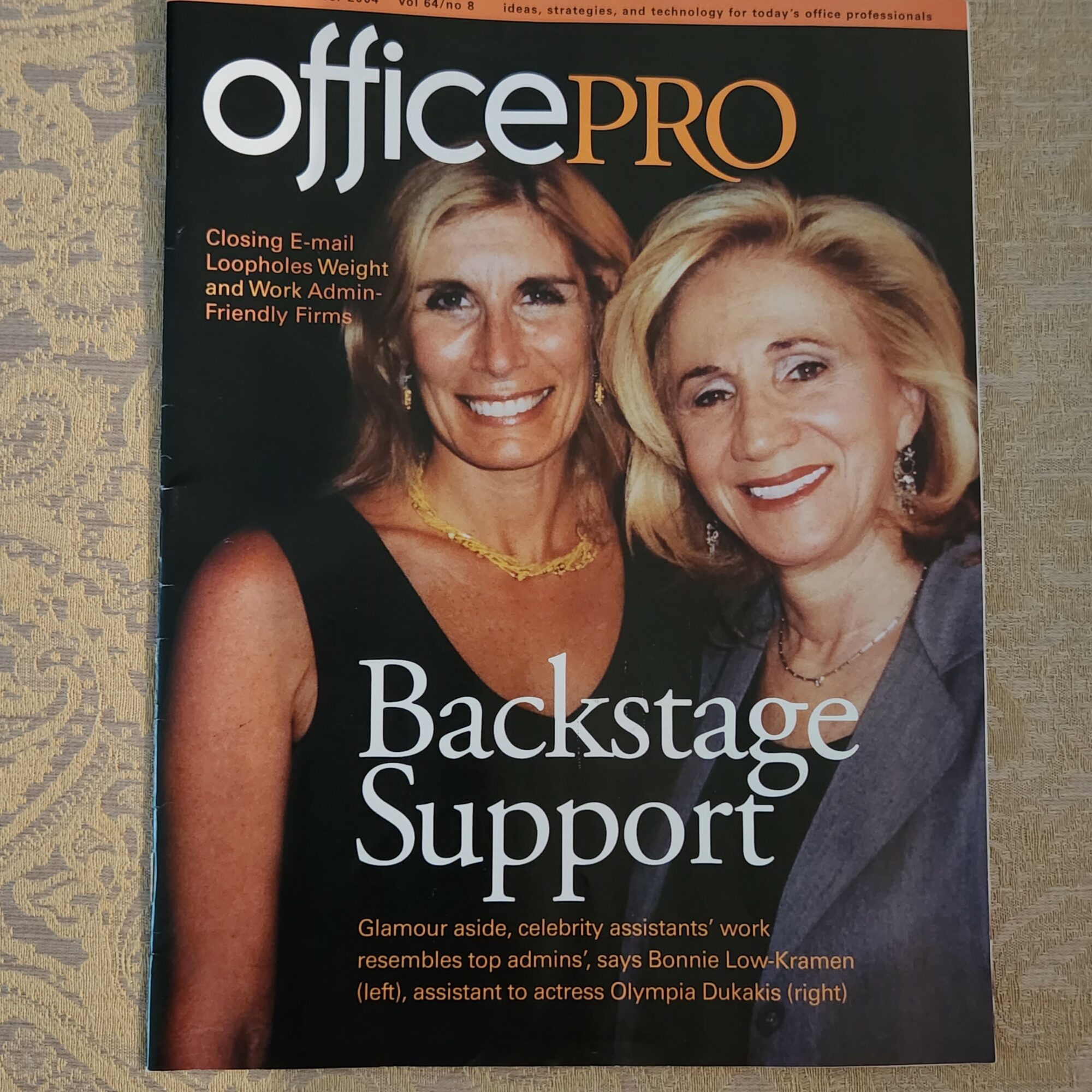 Two women smiling on magazine cover, with text 'Backstage Support' and additional headlines.