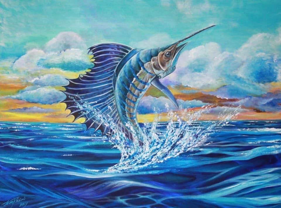 A fish with a long, pointed snout jumps out of the water, with a colorful sky and ocean in the background.