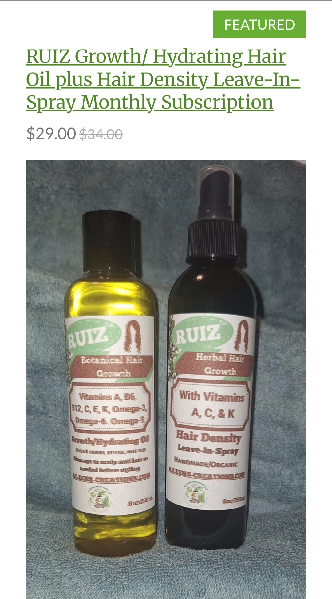Two bottles of hair growth spray, one yellow and one black, with labels and spray caps, on a dark surface.