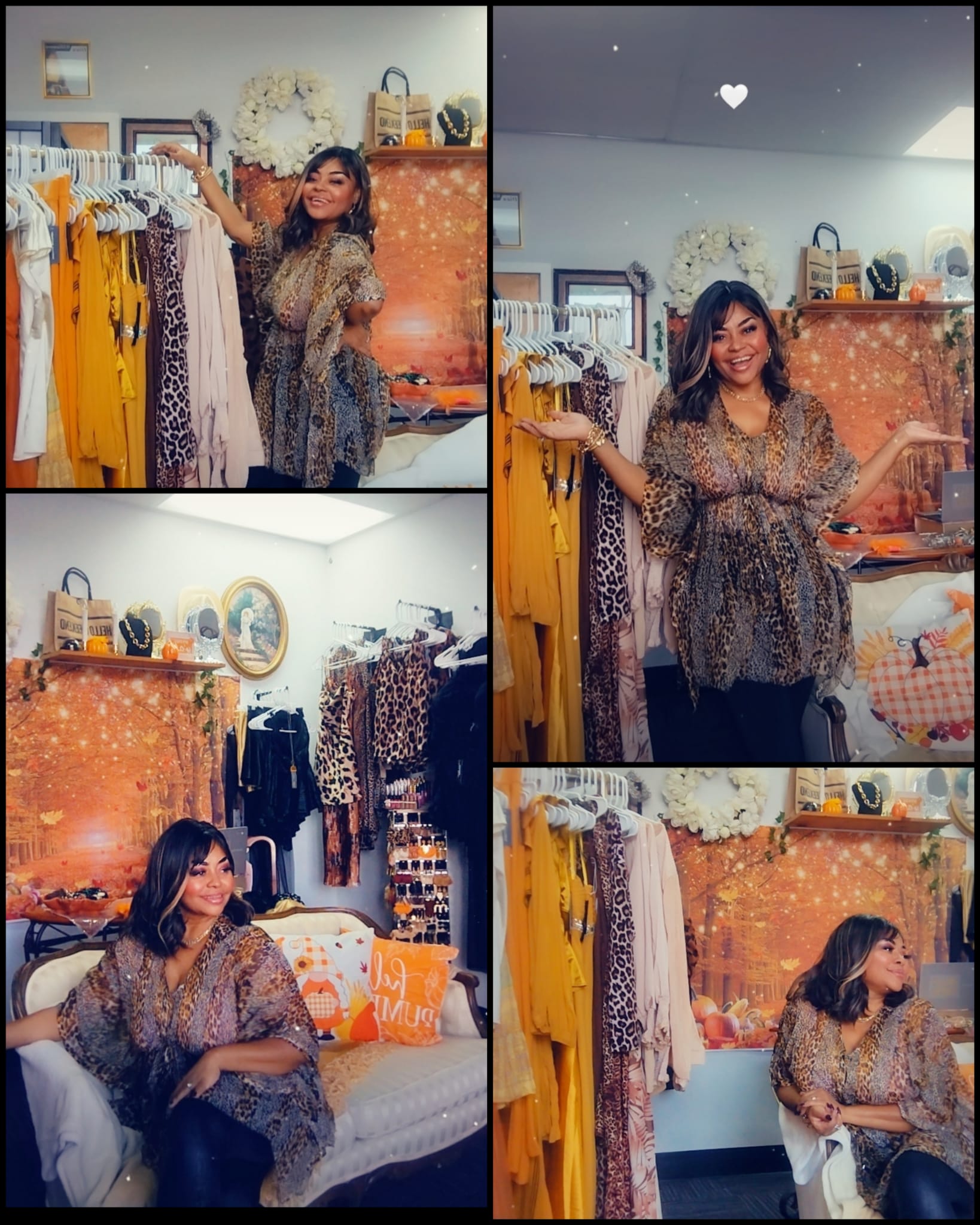 Woman standing next to clothing rack in room with orange wall, smiling, wearing patterned top, with bed and decor in background.