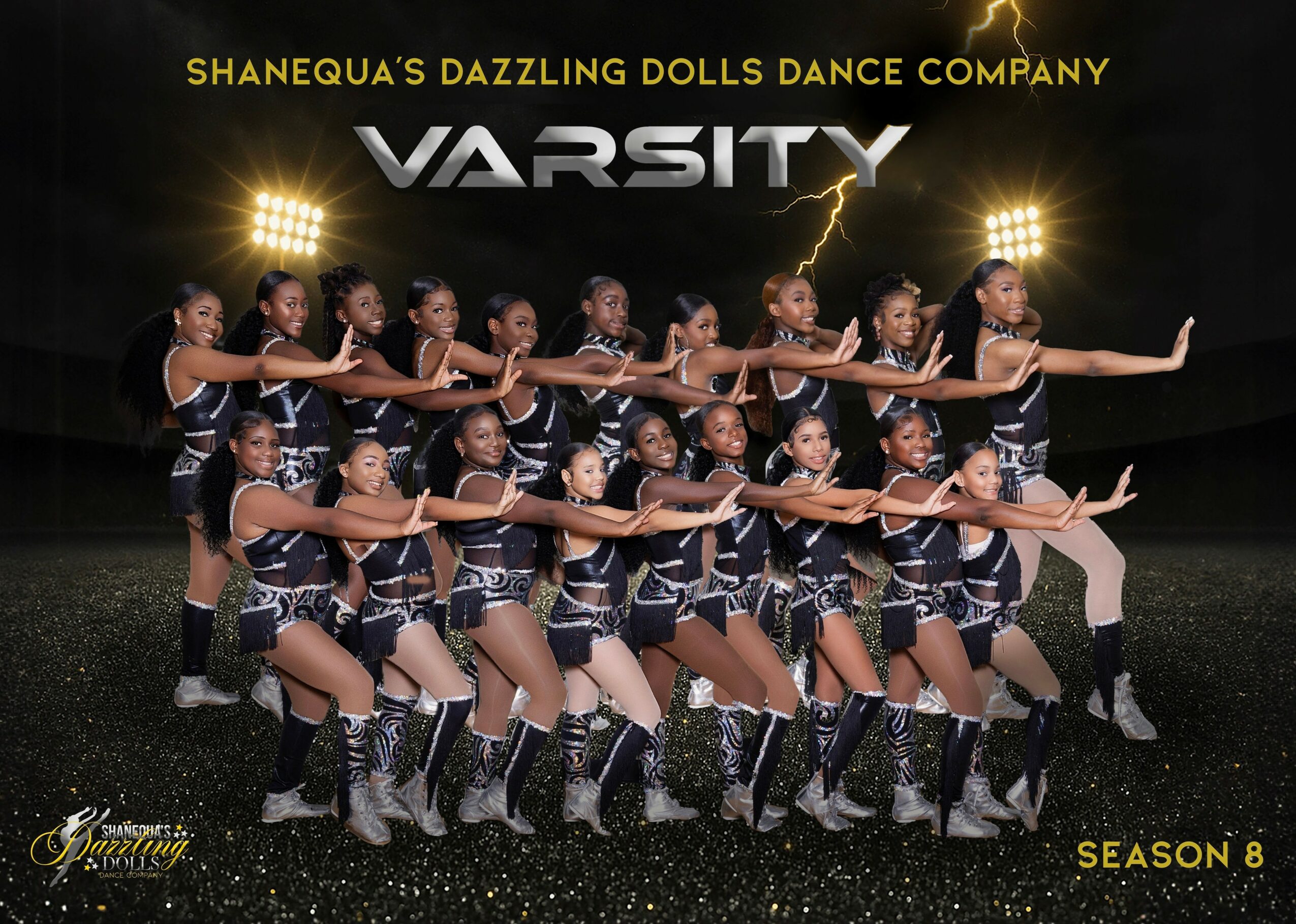 Group of young dancers in matching outfits performing a synchronized dance on stage, with bright lights behind them.