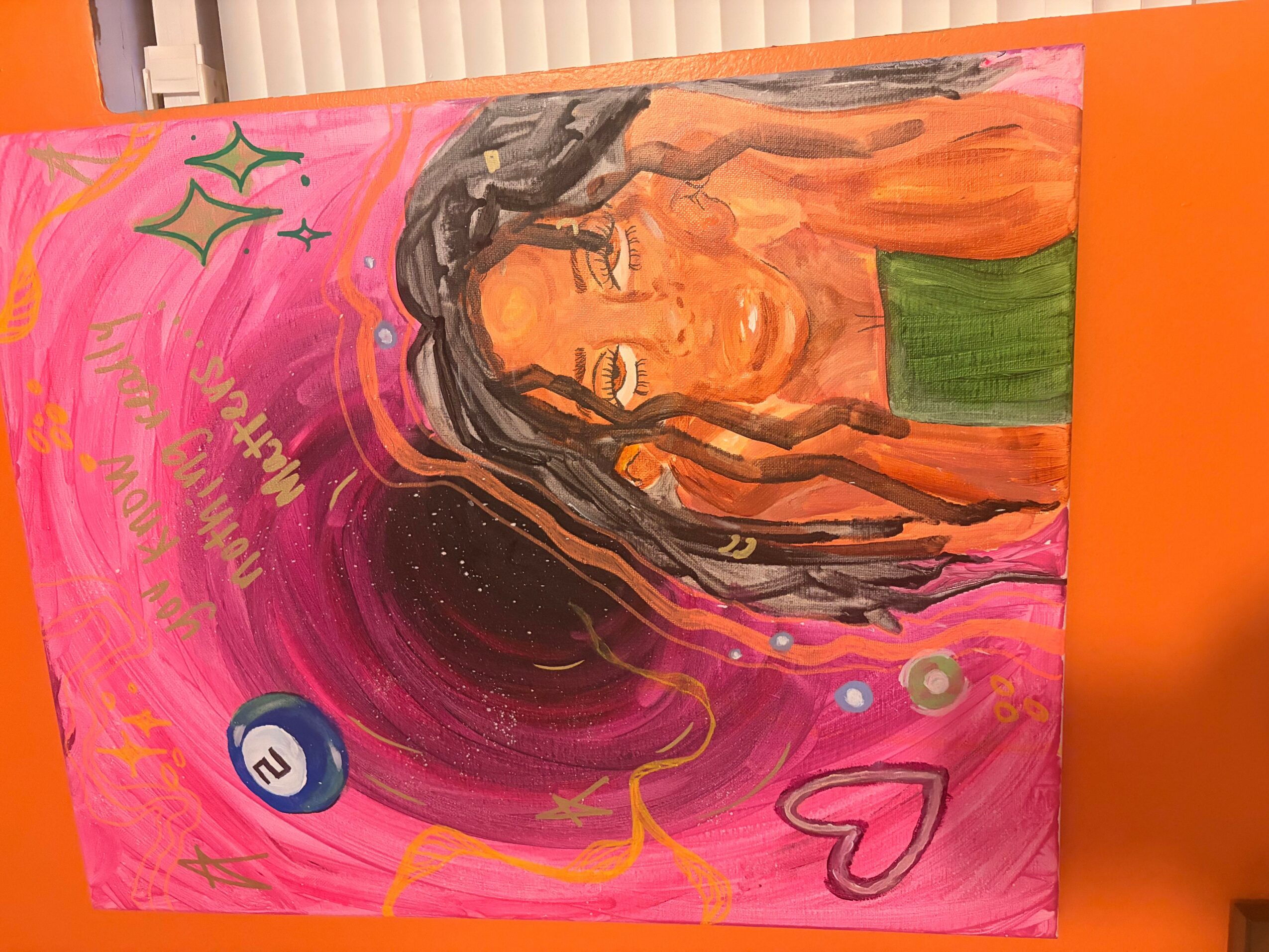 Painting of a woman with long dreadlocks, orange background, green top, surrounded by stars, hearts, and cosmic elements.