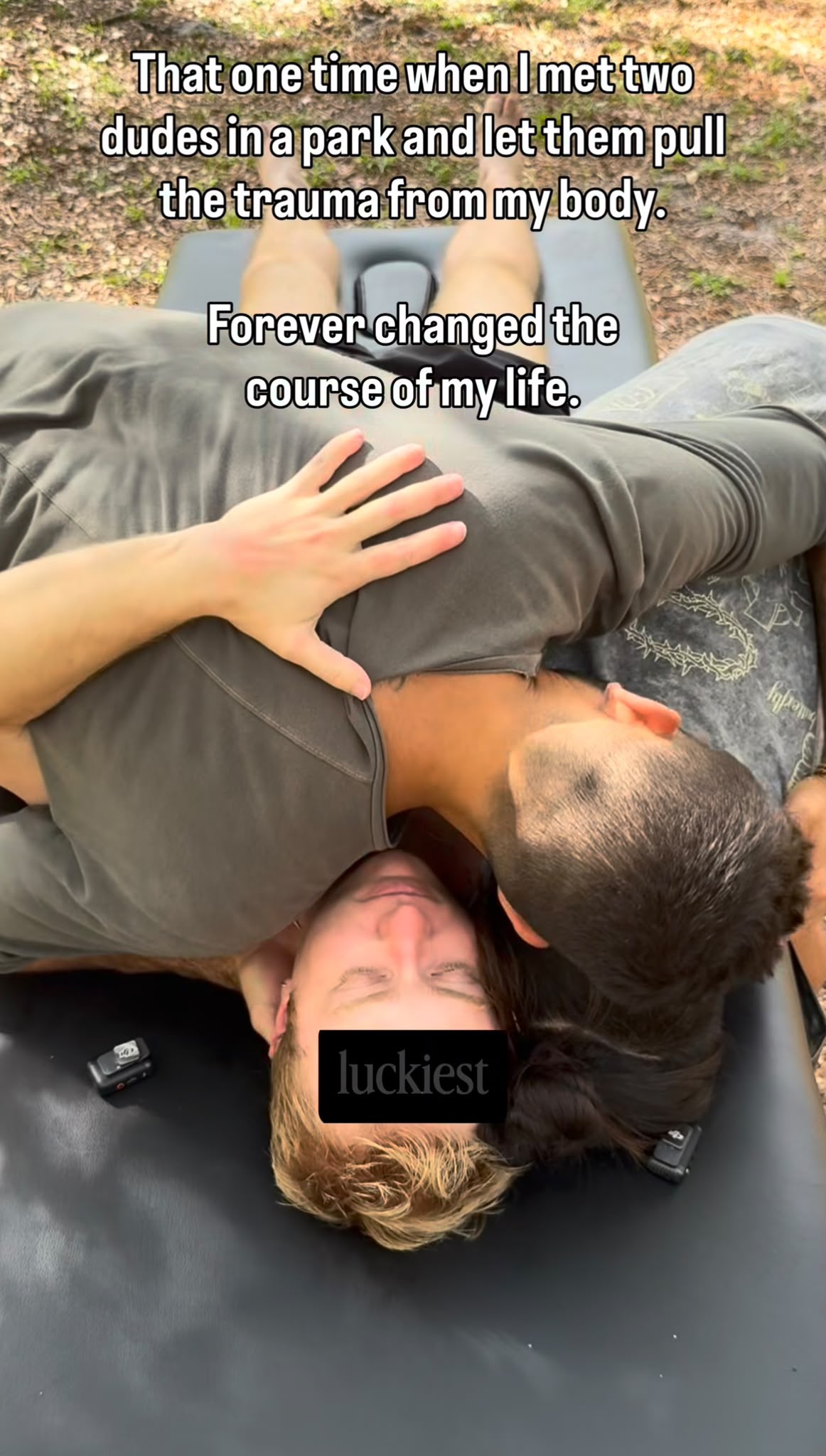 Two people lying on a surface, one resting their head on the other's chest, with text overlay about a meaningful moment.
