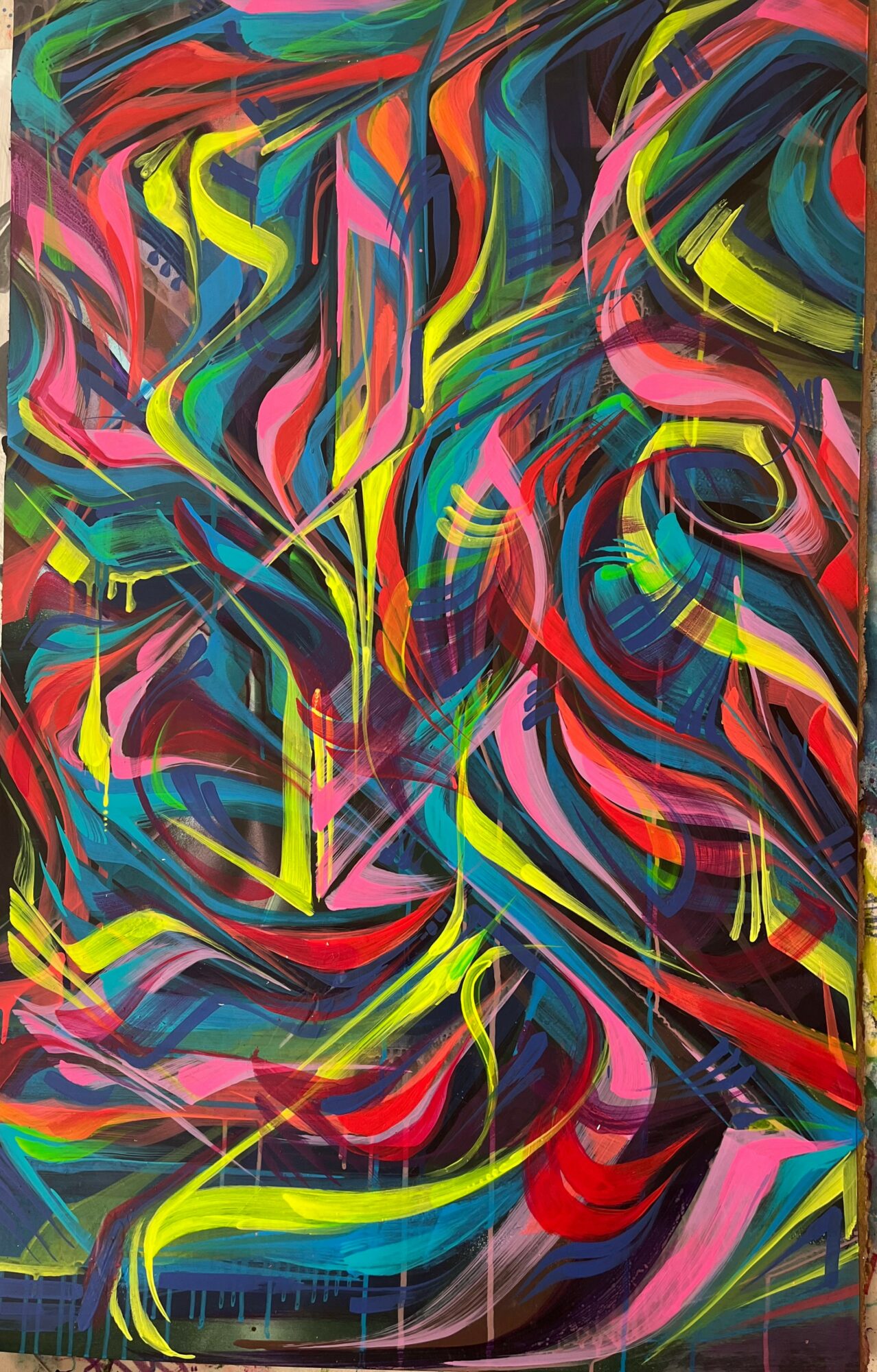Abstract painting with vibrant, swirling colors including pink, yellow, blue, green, and black, creating dynamic movement.