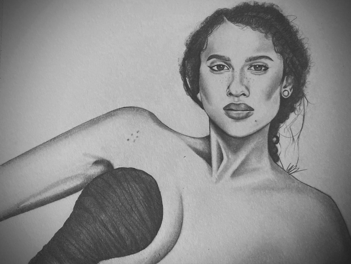 Black and white drawing of a woman with short curly hair, looking directly at the viewer, with a large circular object on her shoulder.