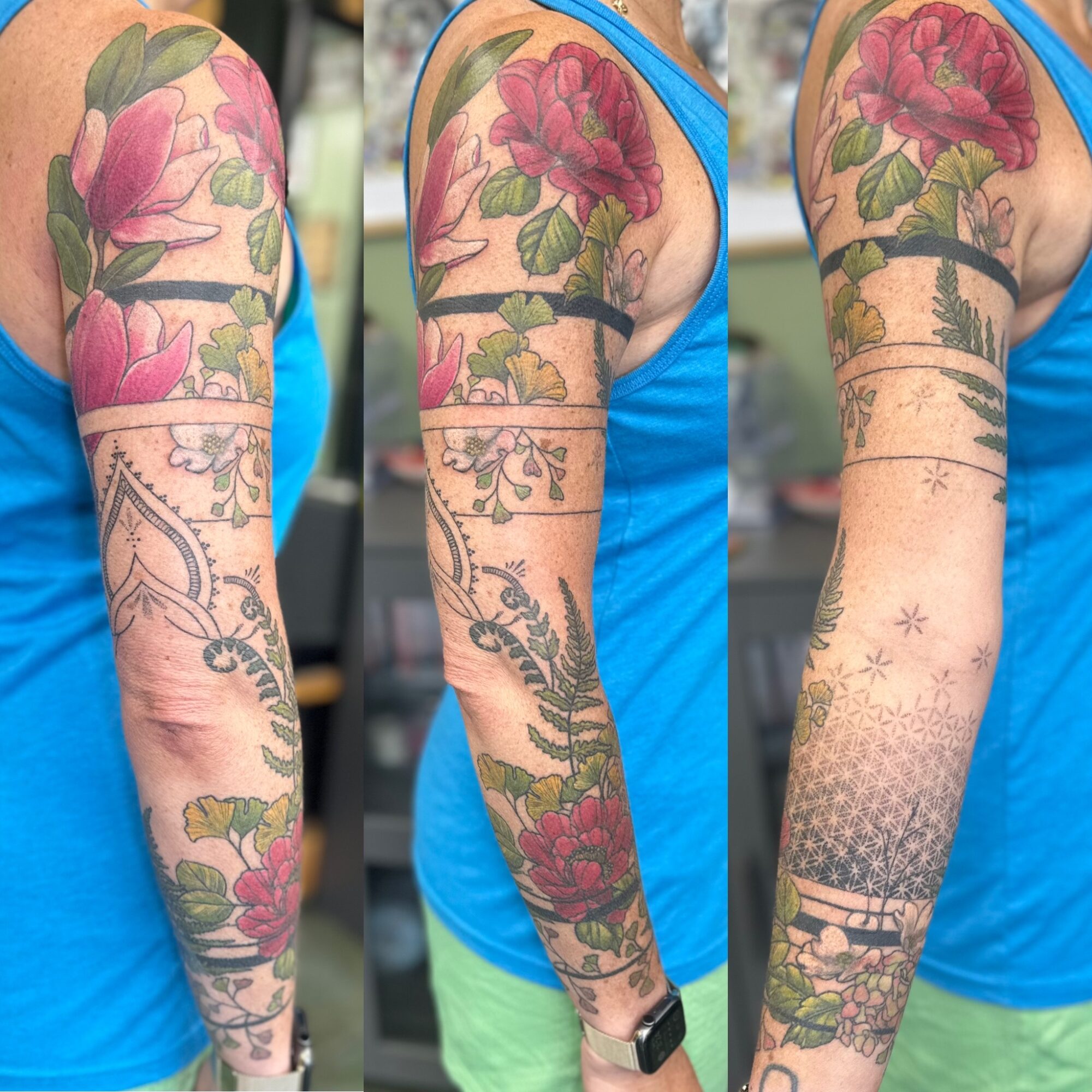 Colorful floral tattoo sleeve with pink flowers and green leaves on arm, with geometric patterns and shading, seen from side.