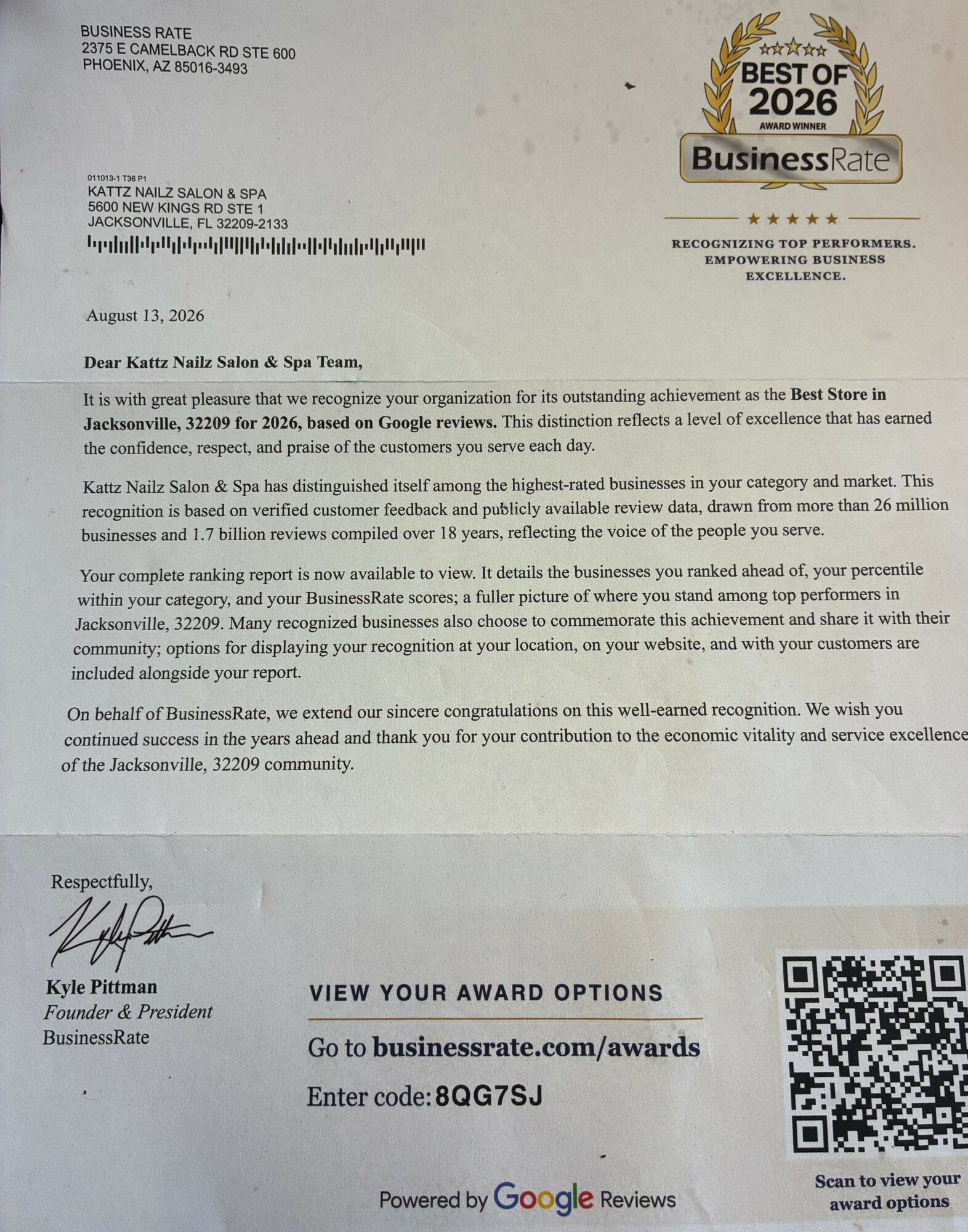 Certificate of recognition awarded to Kate Neal Salon & Spa for achievement at Best Stores in 2026, with a gold badge and Business Rate logo, dated August 13, 2026, signed by Kyle Fitzman, with a Google Reviews link.